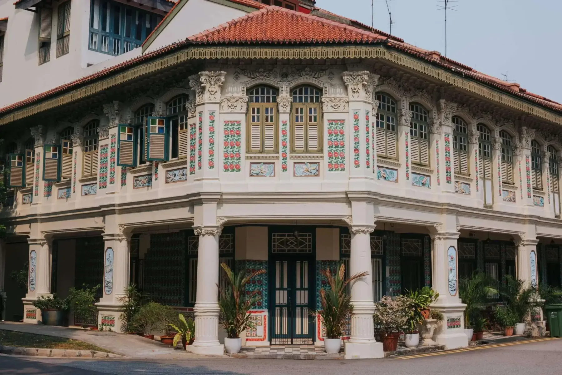 A restored corner row of conserved shophouses at Petain Road in Singapore